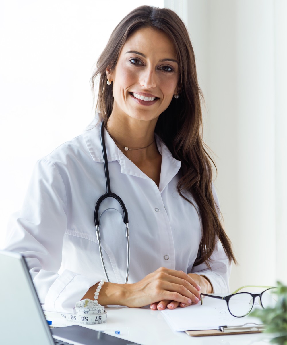 beautiful-young-female-doctor-looking-camera-office-1